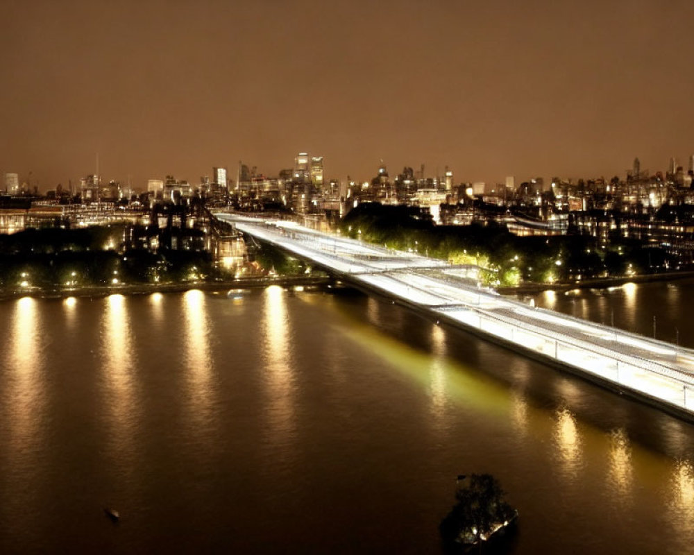 Brightly Lit Bridge Over River with City Lights at Night