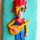 Colorful Clay Model of Person with Red Hair, Green Glasses, Yellow Guitar on Teal Background