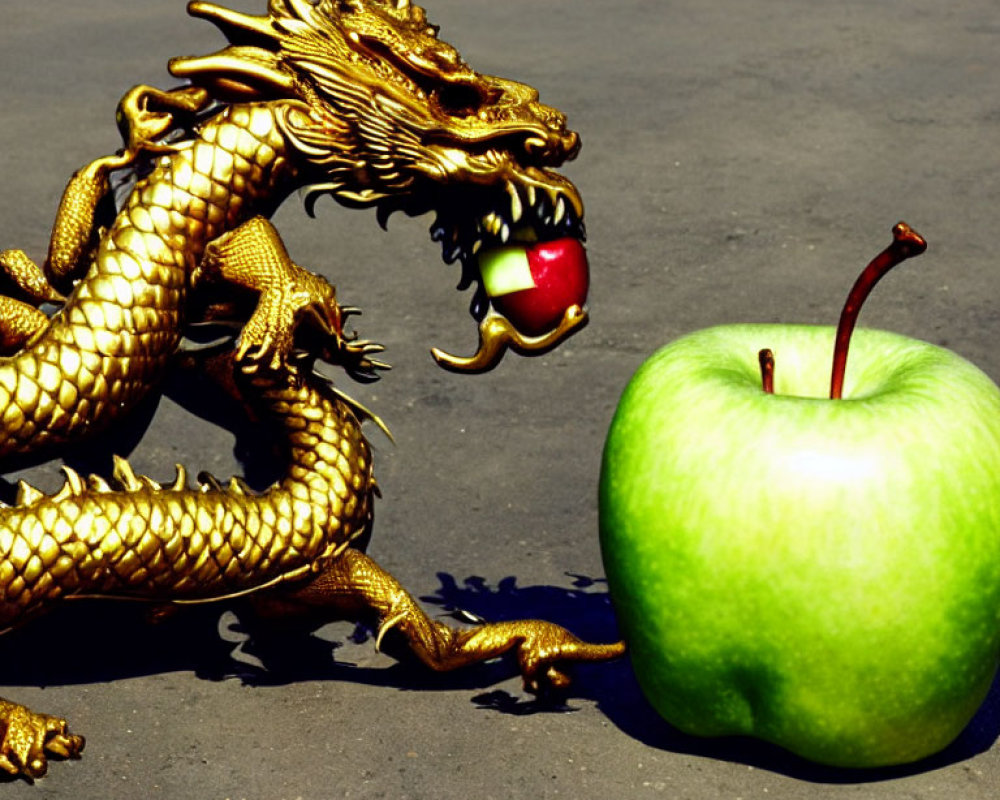 Intricate Golden Dragon Statue Next to Large Green Apple