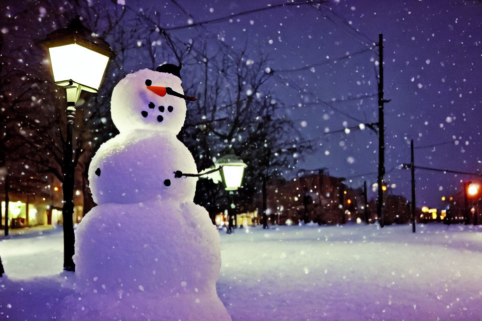 Snowman with carrot nose under streetlights in falling snow