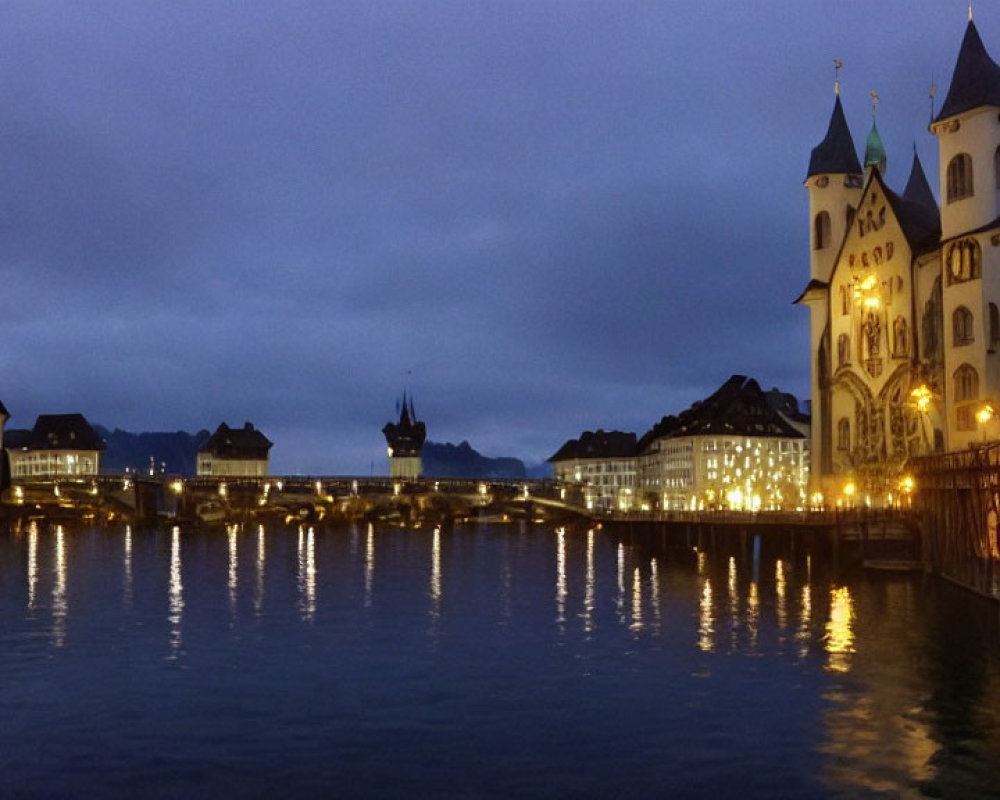 Cityscape: Calm River, Illuminated Buildings, Church with Twin Towers, Covered Bridge