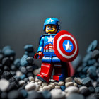 Captain America Lego Figurine with Shield on Rock Background