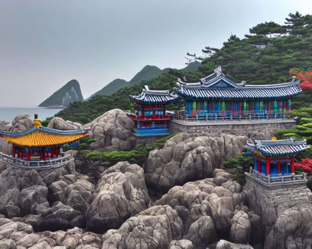 Korean-style Pavilions on Rocky Terrain with Misty Mountain