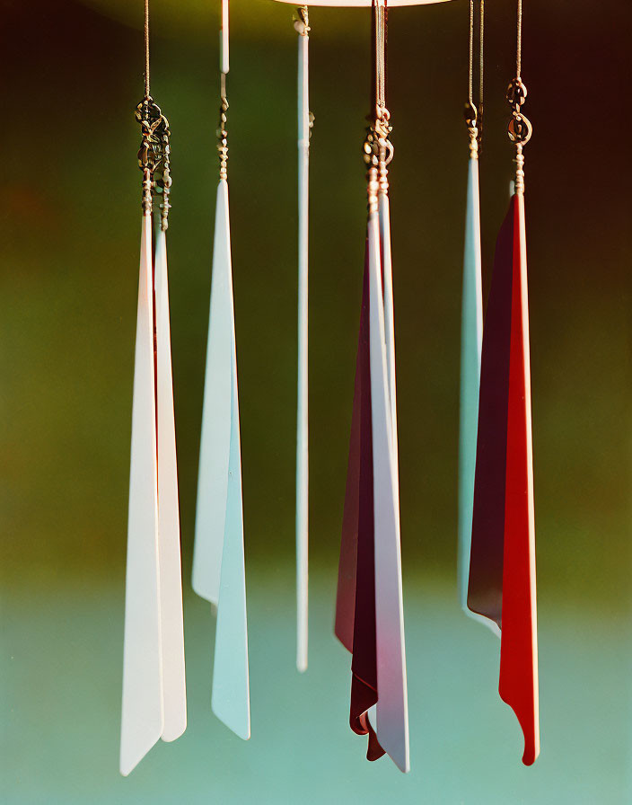 Vibrant wind chimes on gradient background