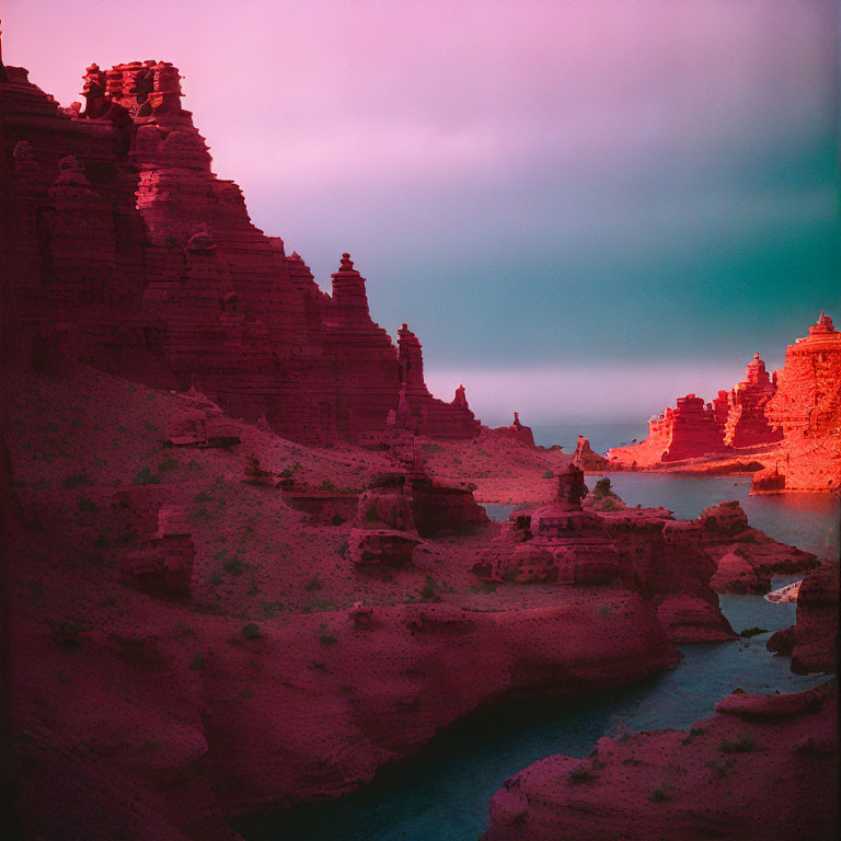 Red Rock Formations under Moody Purple Sky with River Canyon Shadow