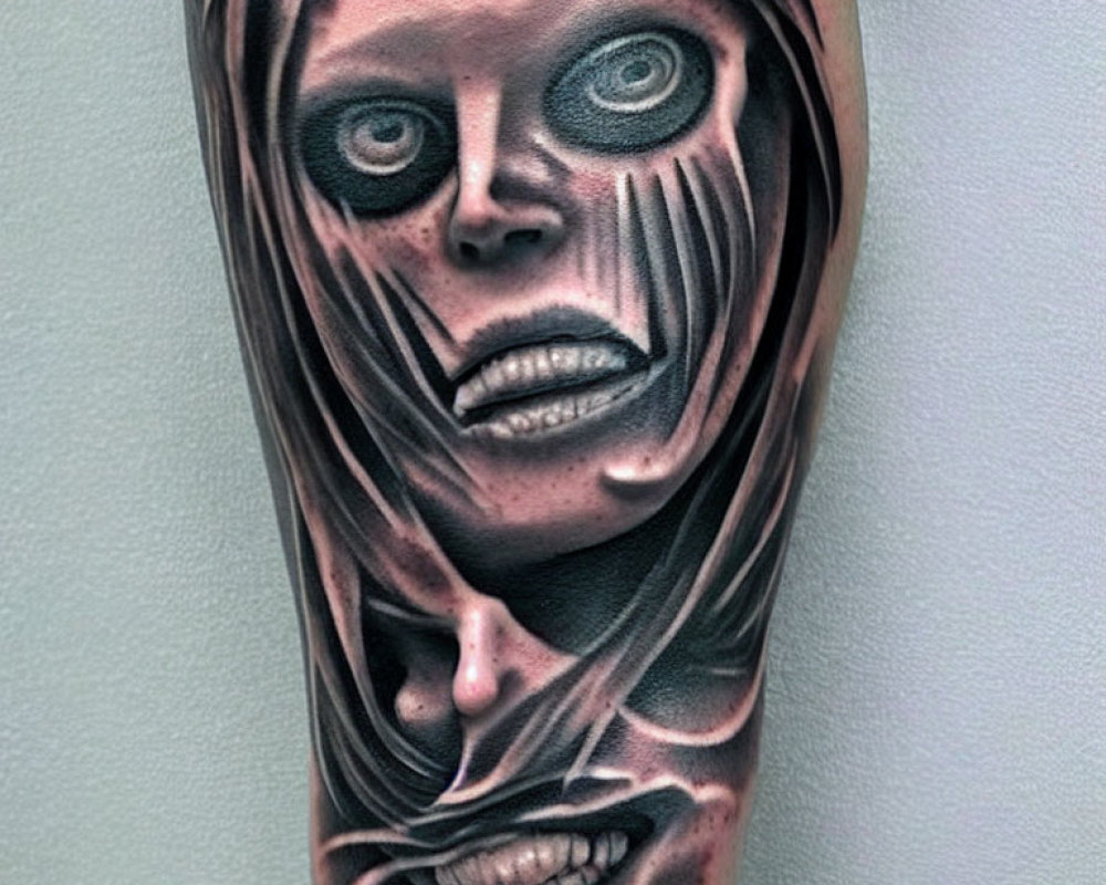 Realistic black and gray tattoo: distorted face with multiple eyes and mouths