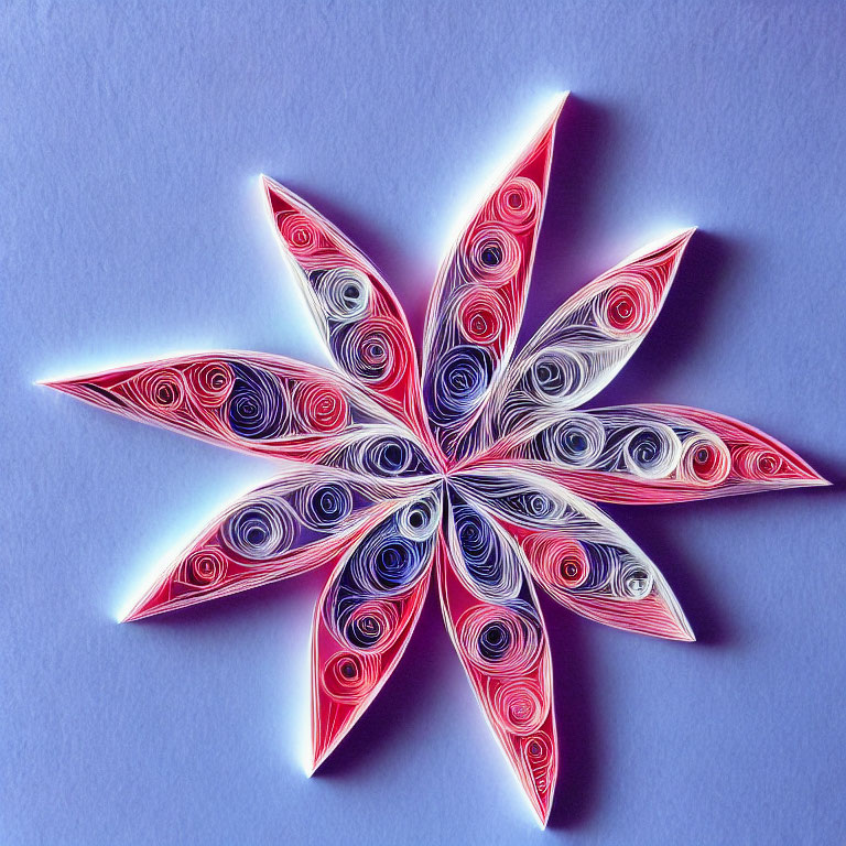 Intricate Quilled Paper Star Artwork with Red, White, and Blue Swirls