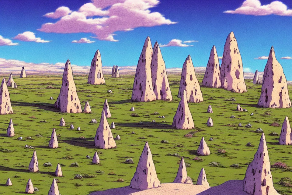 Surreal landscape with tall, pointed rock formations on grassy plain