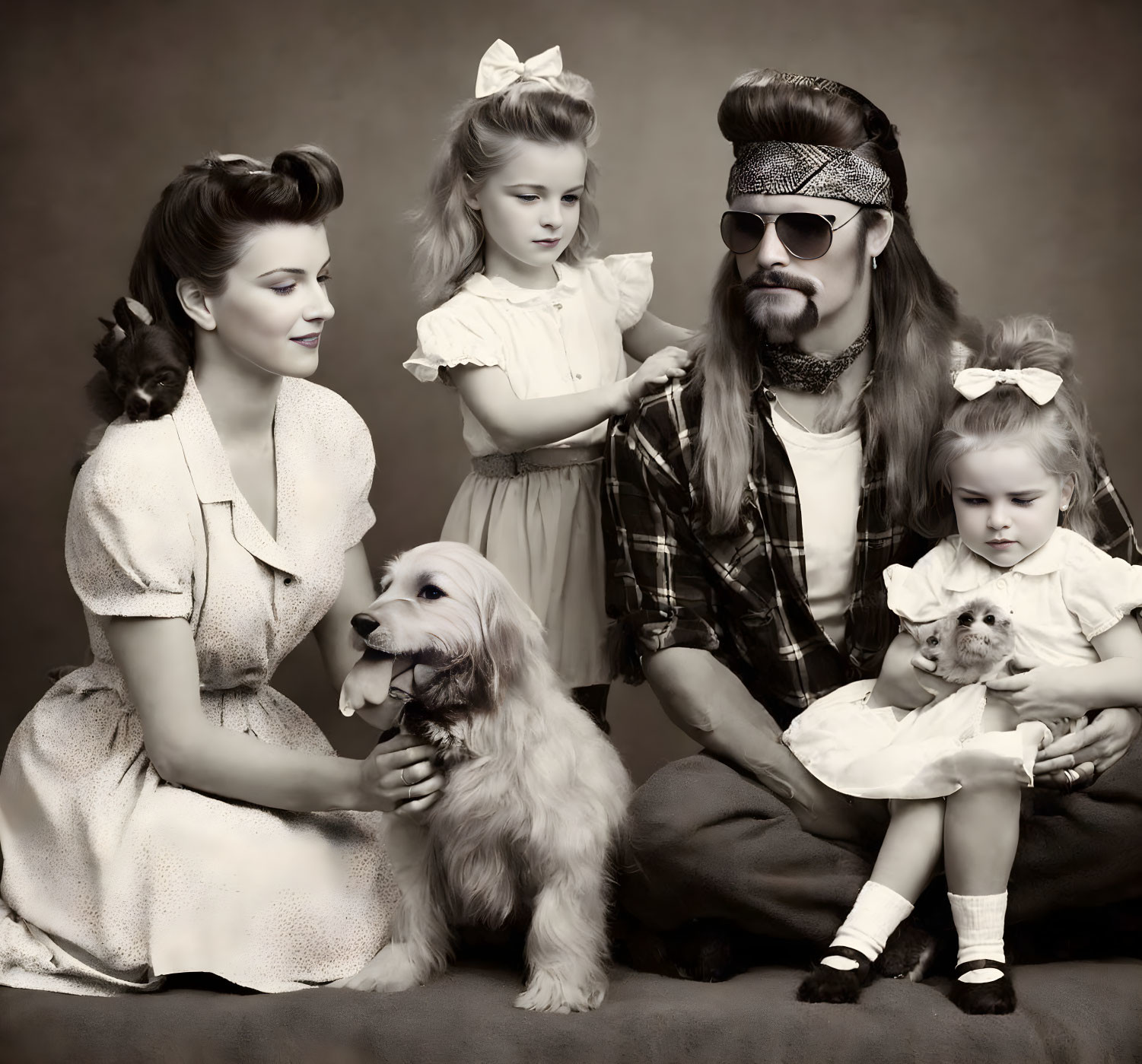 Monochromatic vintage family portrait with parents, girls, dog & kitten