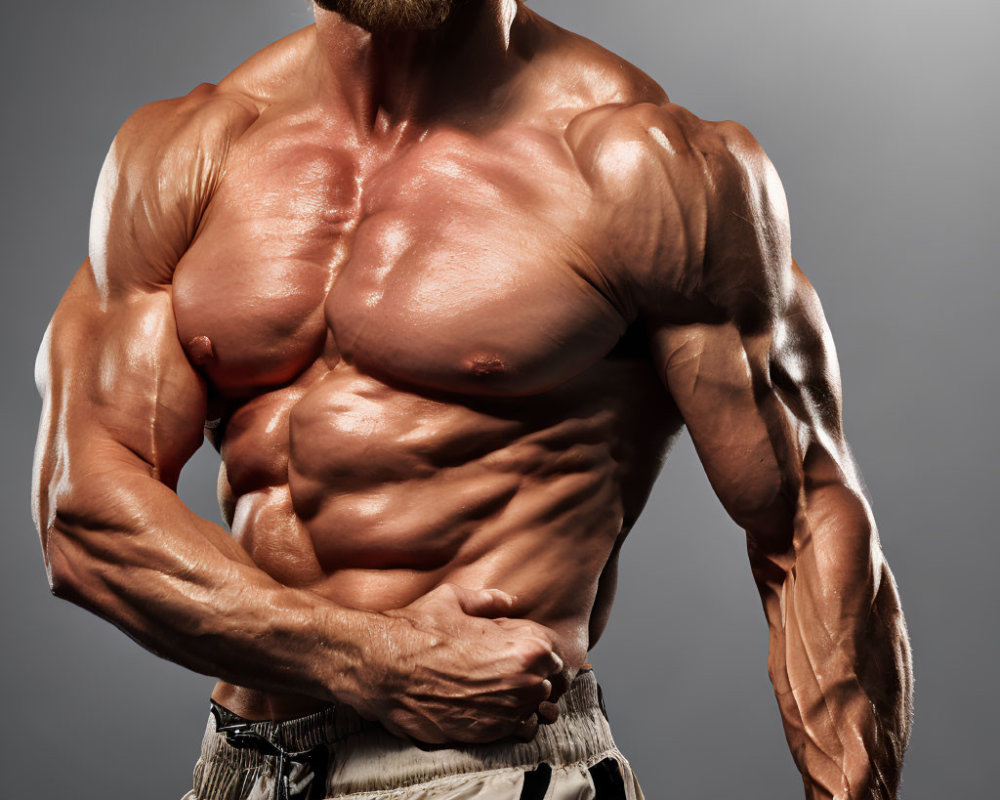 Muscular Bodybuilder with Defined Pecs and Abs on Grey Background