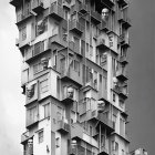 Surreal artwork: Distorted building facade with human facial features