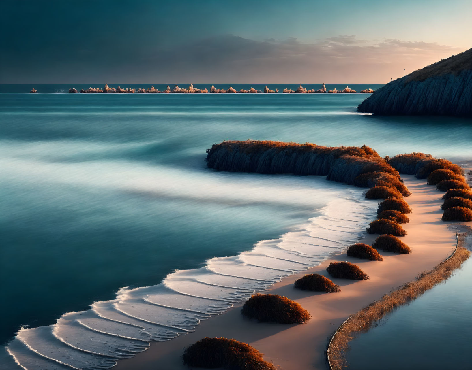 Tranquil Twilight Coastal Scene with Sea, Shore, Bushes, and Cliffs