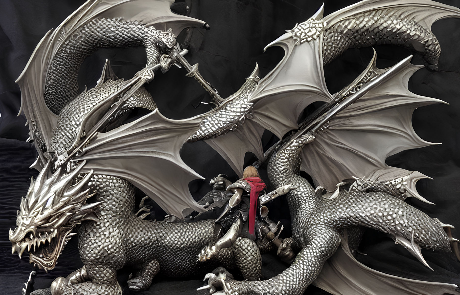 Detailed knight vs. dragon figurine with intricate features