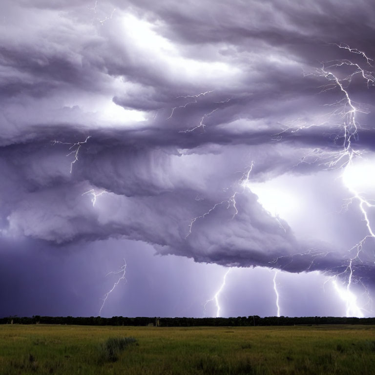 Dramatic thunderstorm with multiple lightning strikes over serene landscape