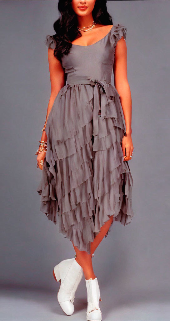 Woman in Gray Ruffled Midi Dress with Cap Sleeves and Accessories