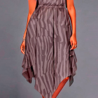 Woman in Gray Ruffled Midi Dress with Cap Sleeves and Accessories