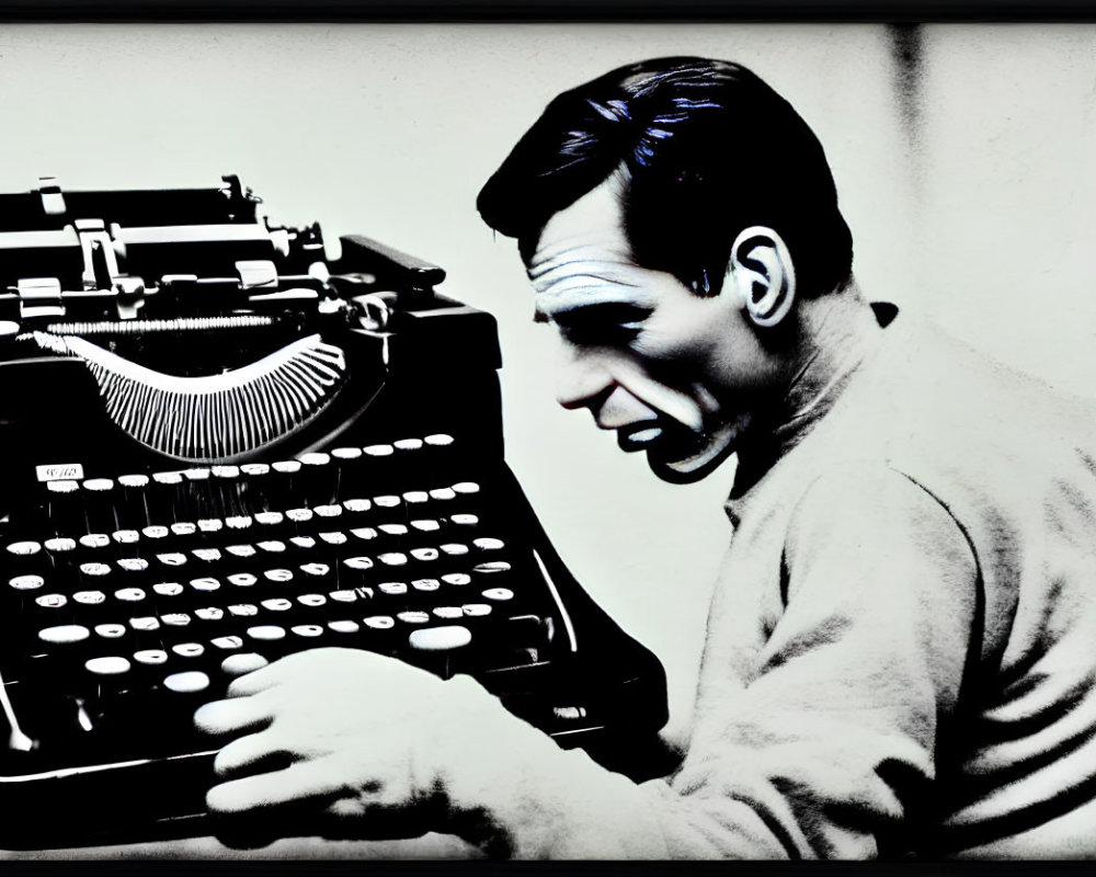 Monochrome image of surprised man at typewriter