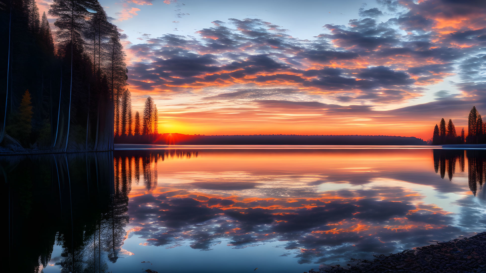 Serene Lake Sunrise with Orange Reflections