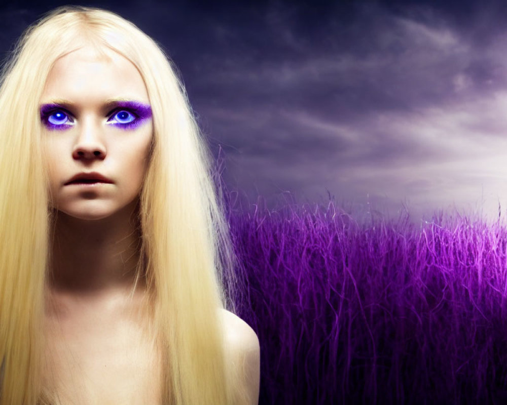 Portrait of young woman with purple eyes and blonde hair against dramatic dusk sky.