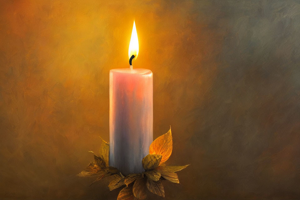 White Candle with Warm Glow on Orange and Gray Background with Dried Leaf Decoration