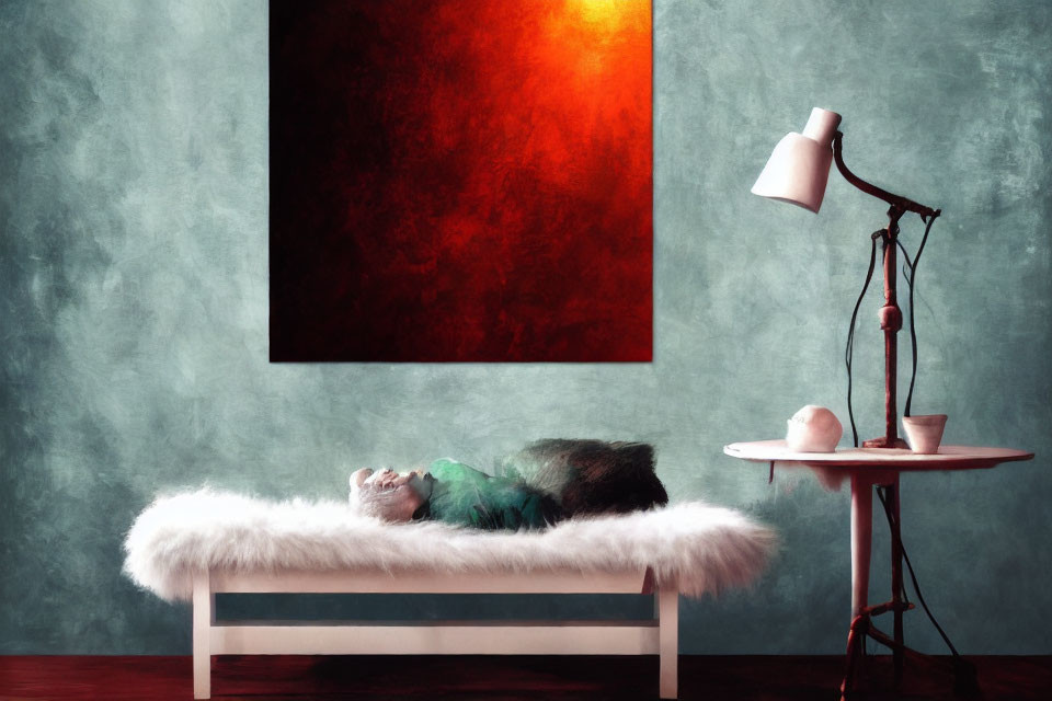 Cozy room with red artwork, teal wall, white bench, fur throw, and round table with