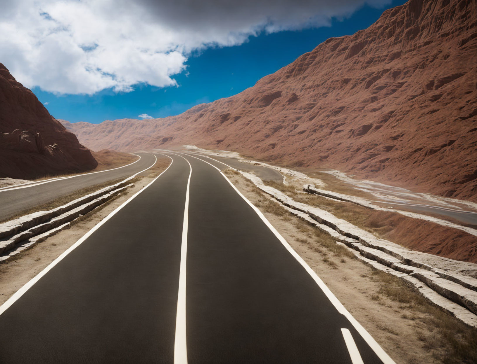 Curving Road Through Arid Red Rocky Terrain