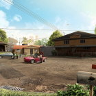 Desolate urban scene with abandoned cars and crumbling buildings