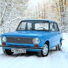 Vintage Blue Car Parked on Snow-Covered Road in Winter Forest