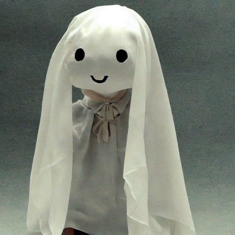 Ghost Costume with White Sheet and Drawn Eyes & Smile