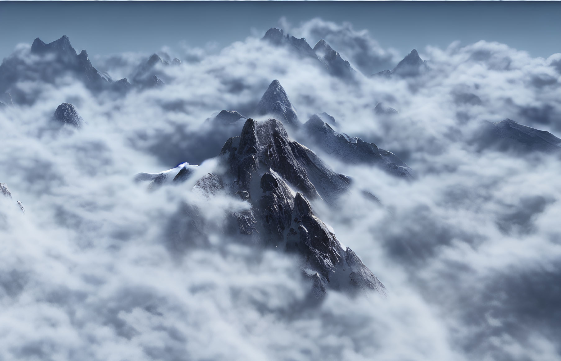 Majestic mountain range with sharp peaks above fluffy clouds