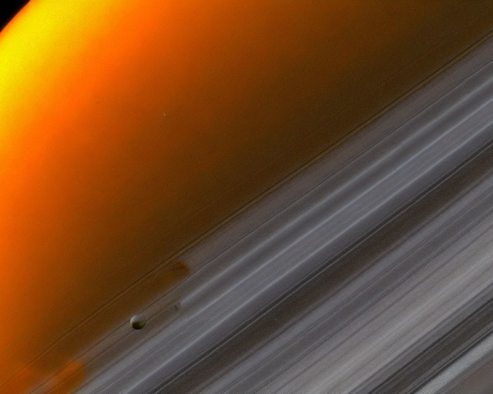 Saturn's orange-hued atmosphere with iconic rings and moon in space.