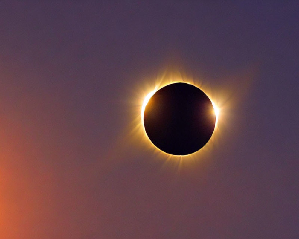 Rare Total Solar Eclipse: Sun's Corona Surrounds Moon Silhouette