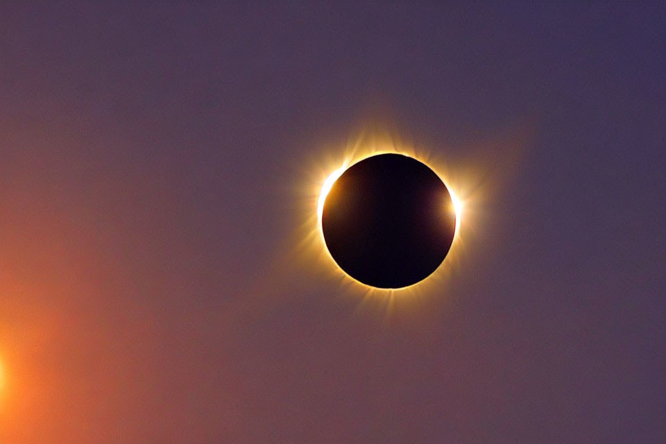 Rare Total Solar Eclipse: Sun's Corona Surrounds Moon Silhouette