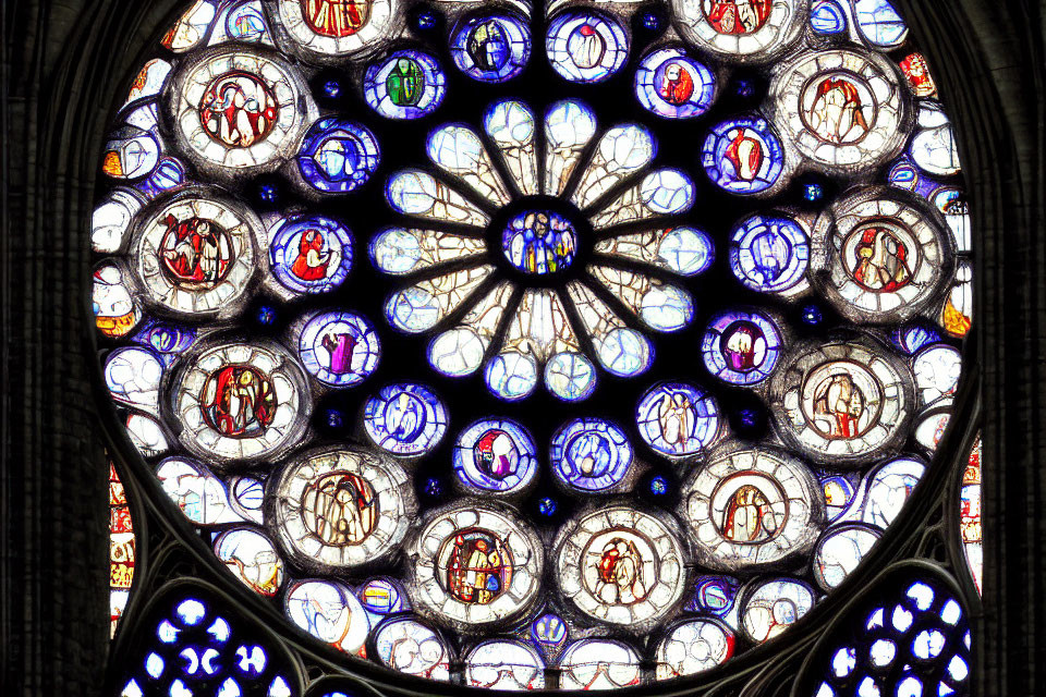 Colorful Stained Glass Window with Floral and Circular Designs