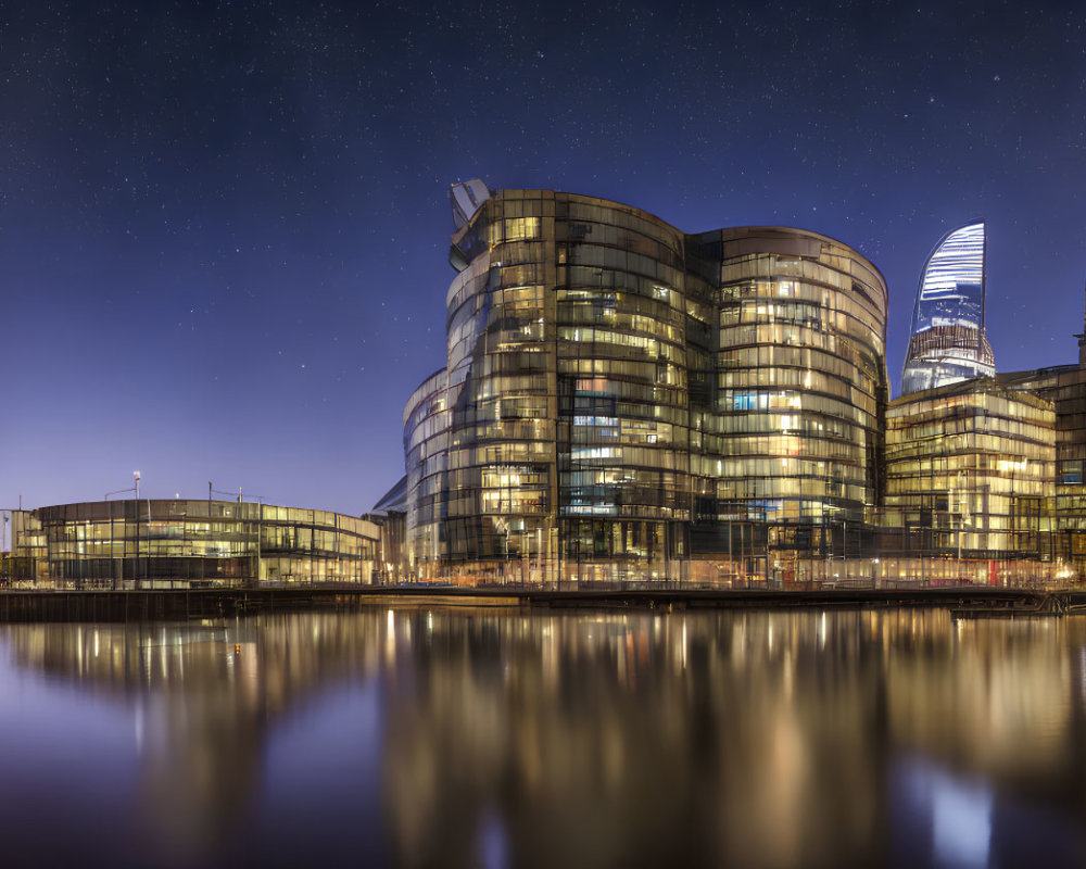 Panoramic Night View of Modern Glass Buildings Reflected in Water