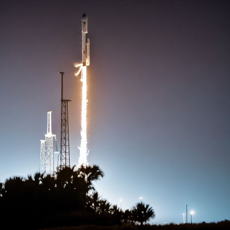 Rocket Launch Creates Fiery Trail in Night Sky