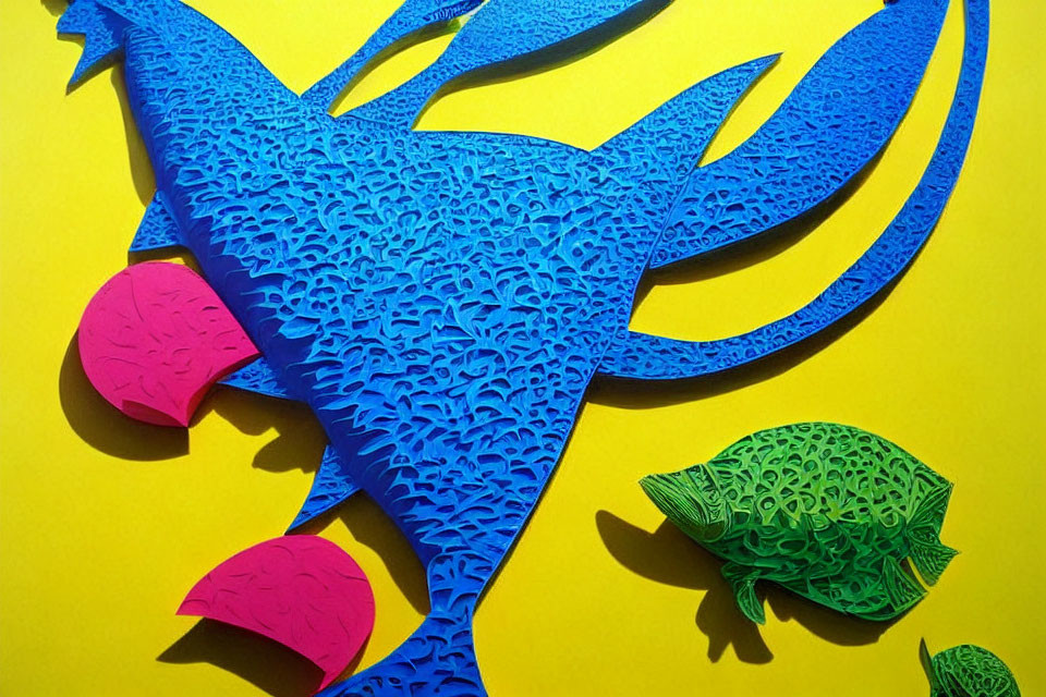 Colorful Paper Art Sculpture of Large Blue Bird with Cutouts on Yellow Background