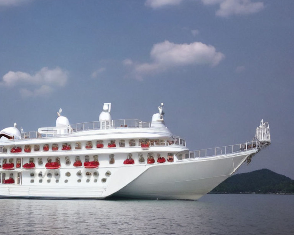 White Cruise Ship Sailing on Calm Blue Waters with Clear Skies