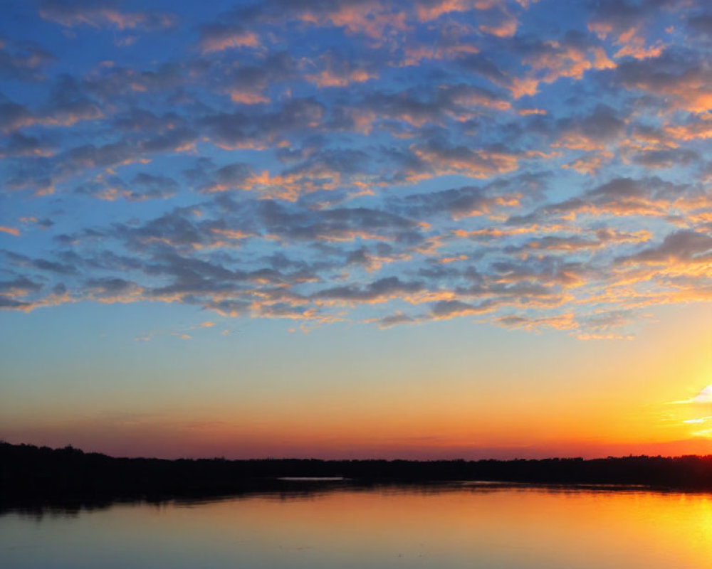 Tranquil Sunset Scene with Orange to Blue Sky Gradient