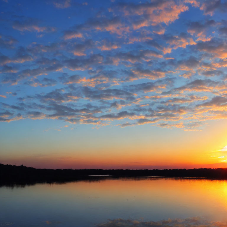 Tranquil Sunset Scene with Orange to Blue Sky Gradient