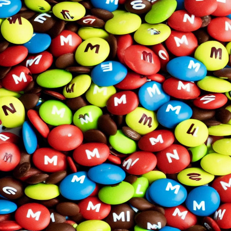 Assorted M&M's Candy in Red, Green, Blue, Yellow & Brown