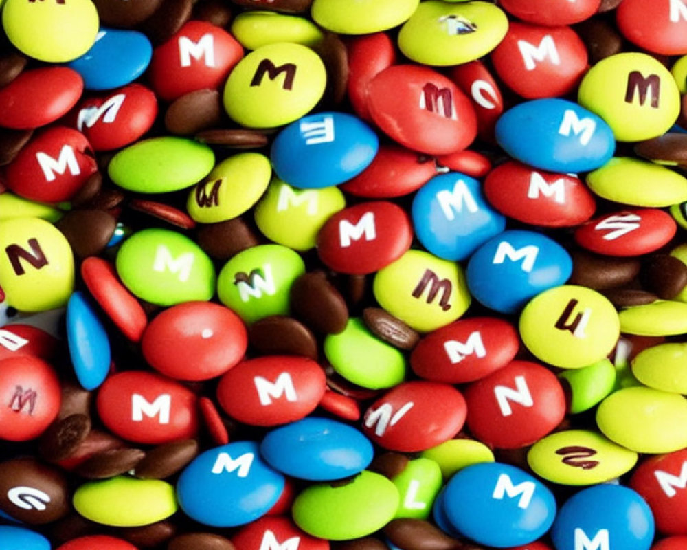 Assorted M&M's Candy in Red, Green, Blue, Yellow & Brown