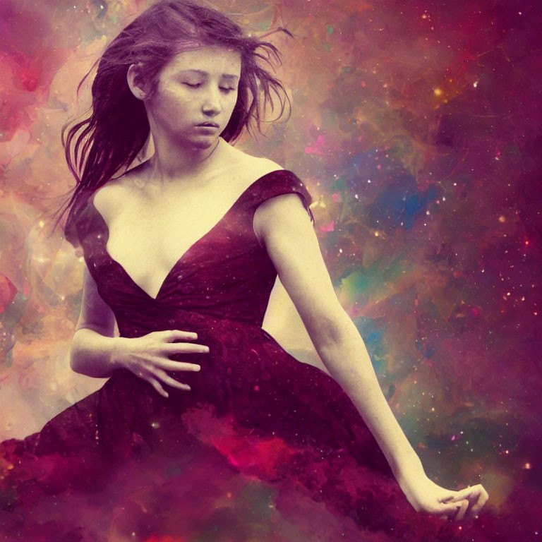 Floating young woman in burgundy dress against multicolored nebula backdrop