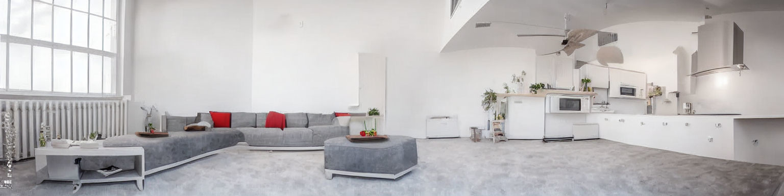 Modern Living Room with Gray Sectional Sofa and Open Kitchen