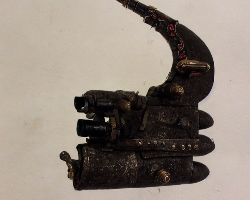 Steampunk-themed prosthetic hand with gears and metal plating