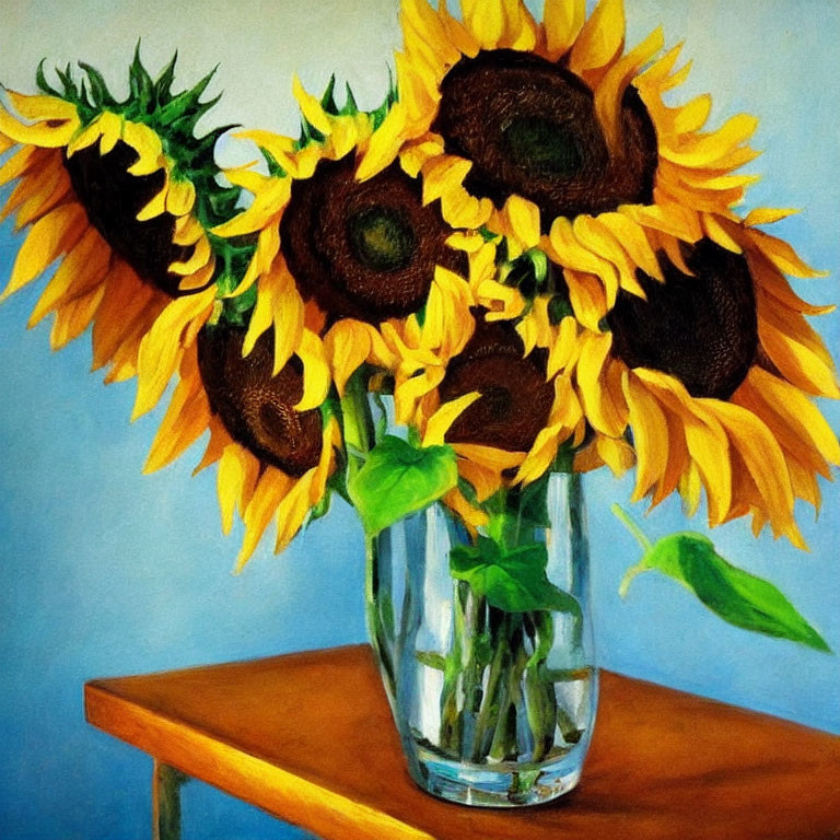 Colorful sunflower bouquet in glass vase on wooden table against blue backdrop