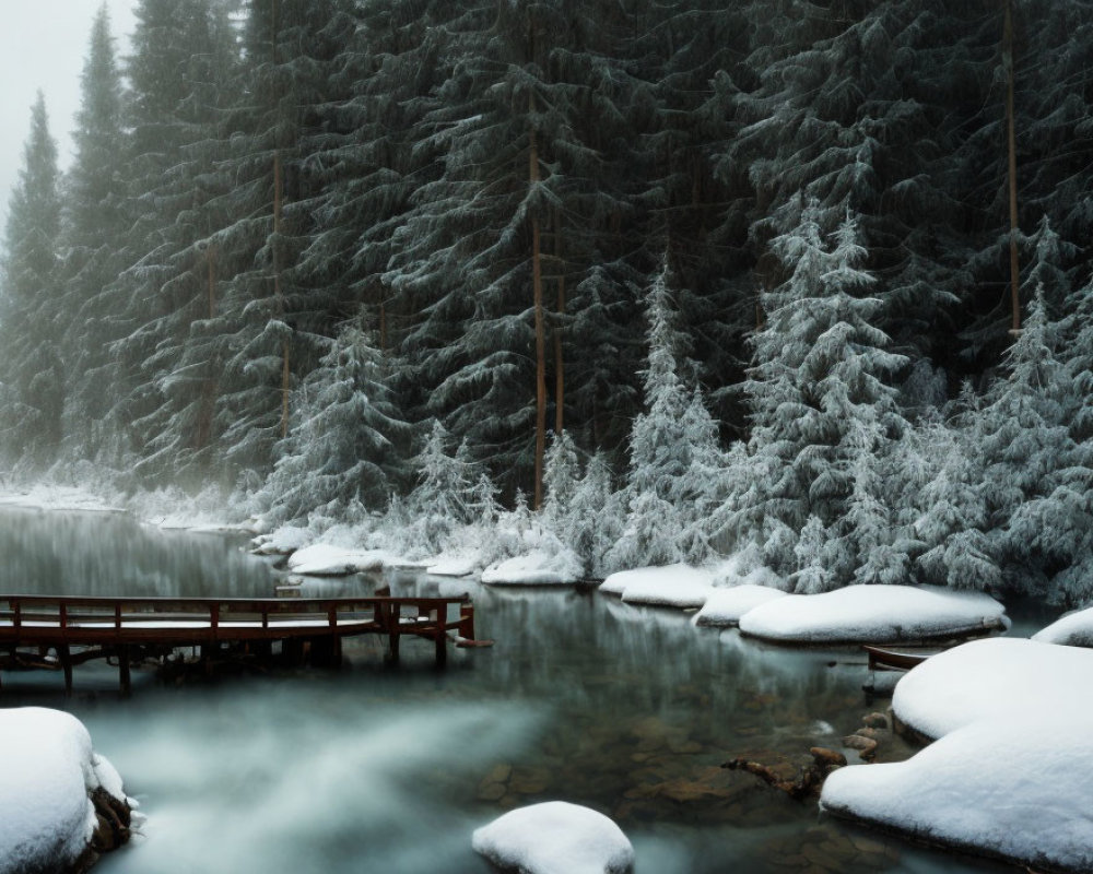 Snow-covered trees, tranquil river, wooden pier in serene winter landscape