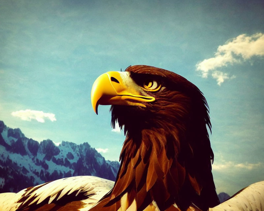 Profile view of majestic bald eagle against blue skies and mountain peaks