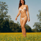 Woman in White Bikini Walking Through Flower Field by Lakeside