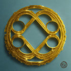 Intricate Golden Celtic Knot on Blue Textured Background